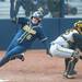 Michigan senior Ashley Lane scores a run after a freshman Kelsey Susalla hit a double during the sixth inning of their game against Iowa at Alumni field Saturday, April 20.
Courtney Sacco I AnnArbor.com